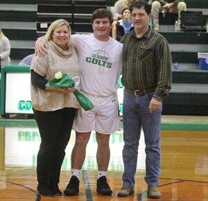 Senior Night Basketball - Male player with family